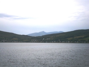 The mountains in the centre of Arran dominate almost every part of the island, in this case Lamlash as viewed from Holy Island across an anchorage big enough for a fleet of warships.