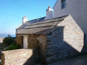 Some of the older buildings have sandstone slabs for rooves - such as this restored shed
