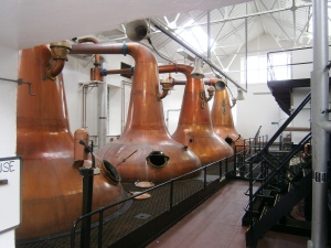 Copper stills. Two to make the first distillation, two for the final one. They are normally padlocked when in production by Customs and Excise.