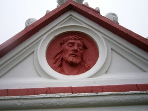 Ecce Homo - Behold the Man. Made from concrete in the portico over the Chapel entrance