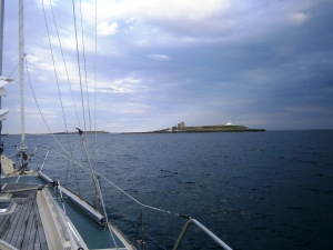 Approaching the Farne Islands. Inner Farne is nearest, with its Pele Tower and lighthouse clearly visible.