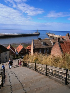 The view out to sea at Whitby. Not much will have changed since James Cook's day - perhaps a couple of new houses and additional lights at the harbour entrance.